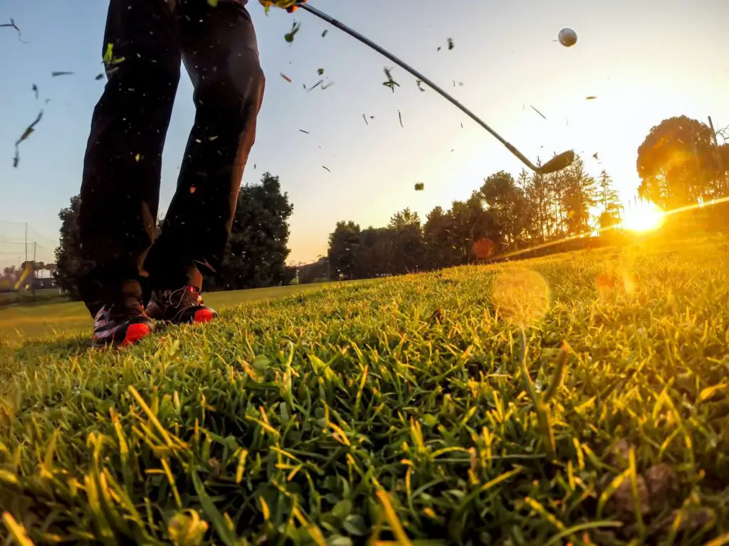 Golf: example of short game using a wedge iron club.