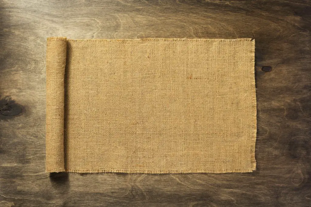 burlap hessian on wooden background