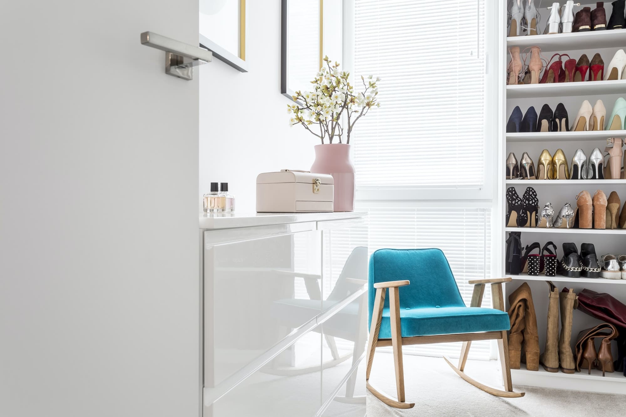 Elegant closet with blue armchair