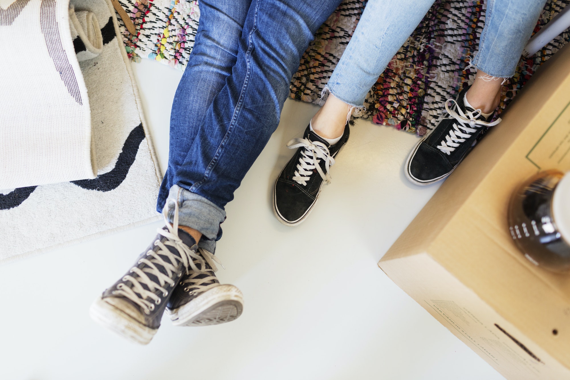 High angle low section of young couple in new house