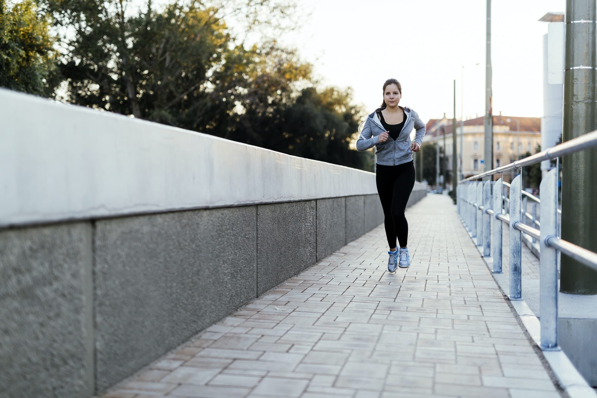 Woman running in city