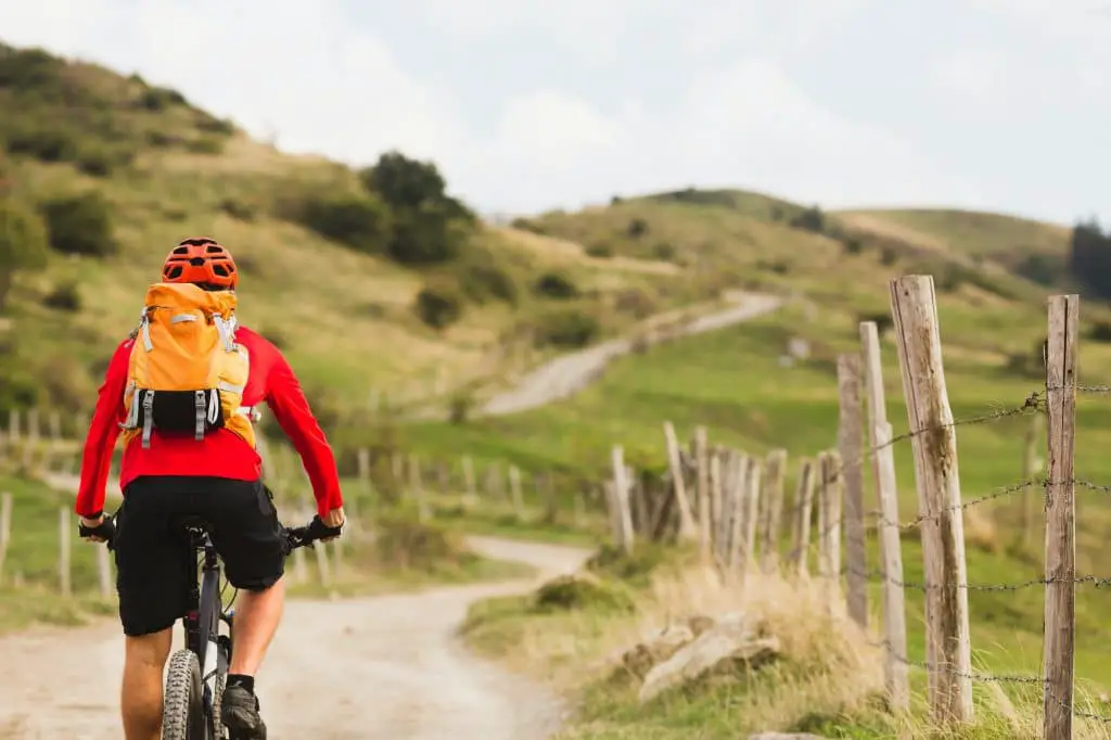 Biker cycling in beautiful mountains