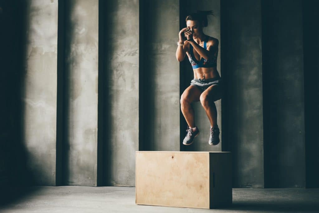 Sport women doing sport exercises at the gym