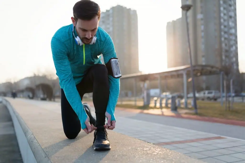 Runner trying running shoes getting ready for run