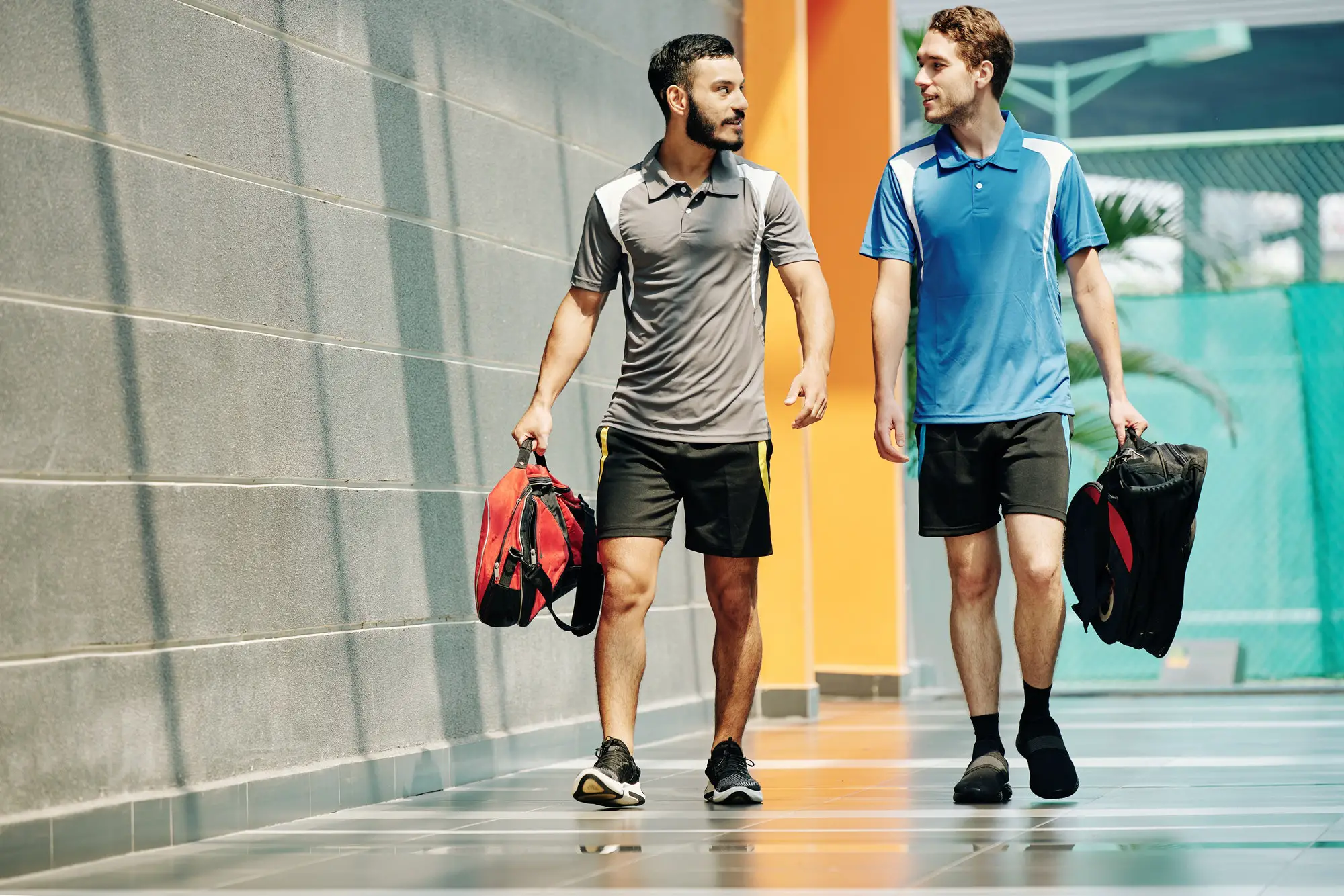Sportsmen walking to gym