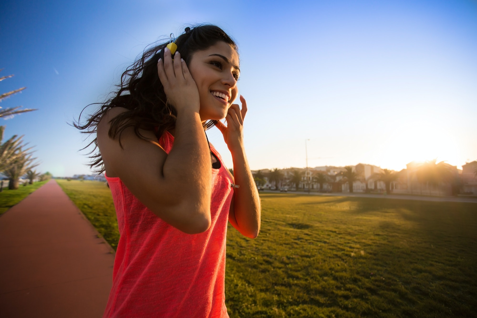 Woman walking and listening music