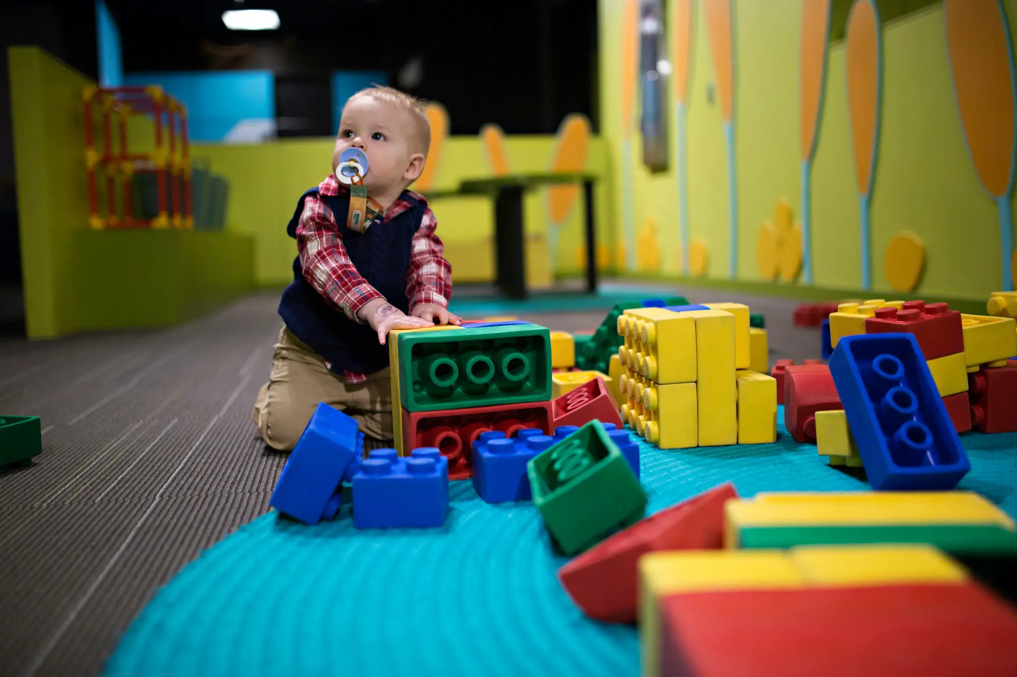 Toddler baby playing at a day care