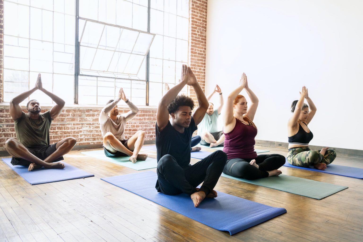 15 Gyms That Have Yoga Classes (& Mat Availability) Love At First Fit